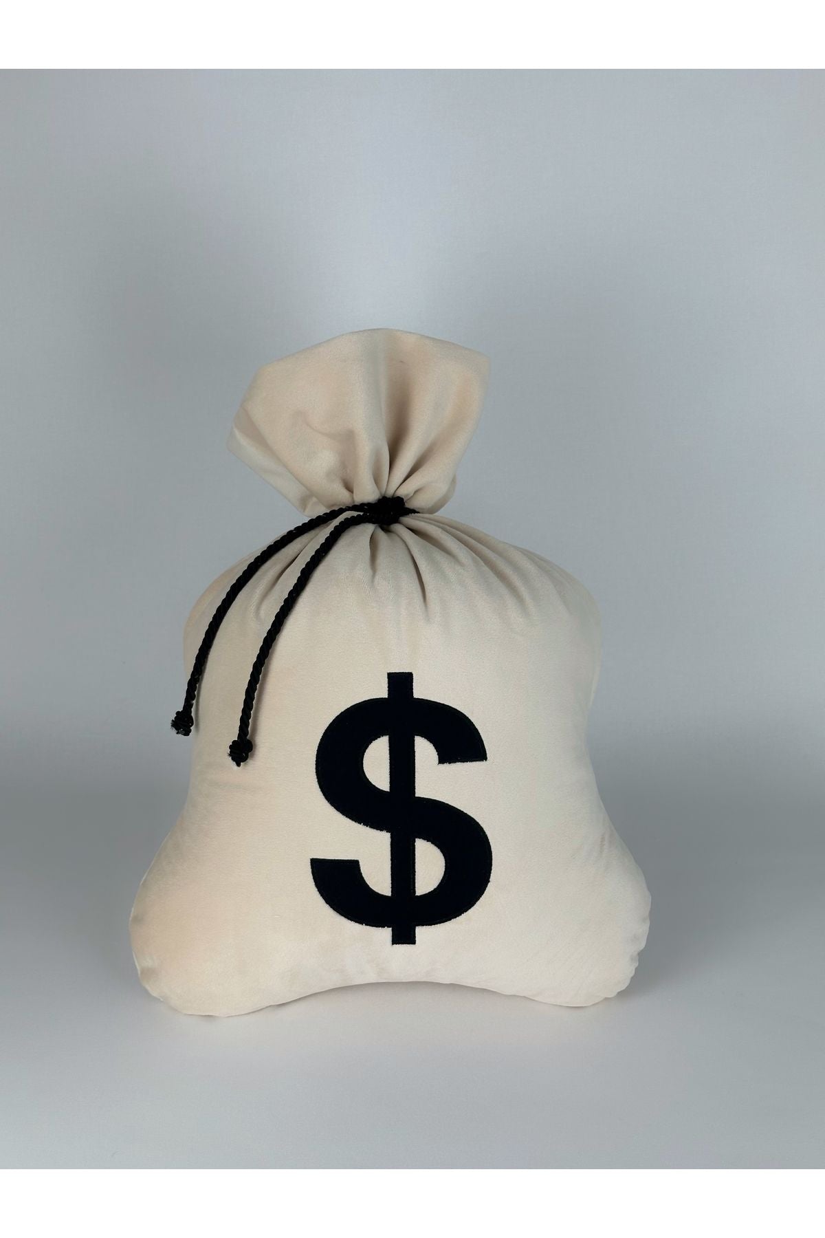Dolar işaretli yastık 50x40 cm ölçülerinde